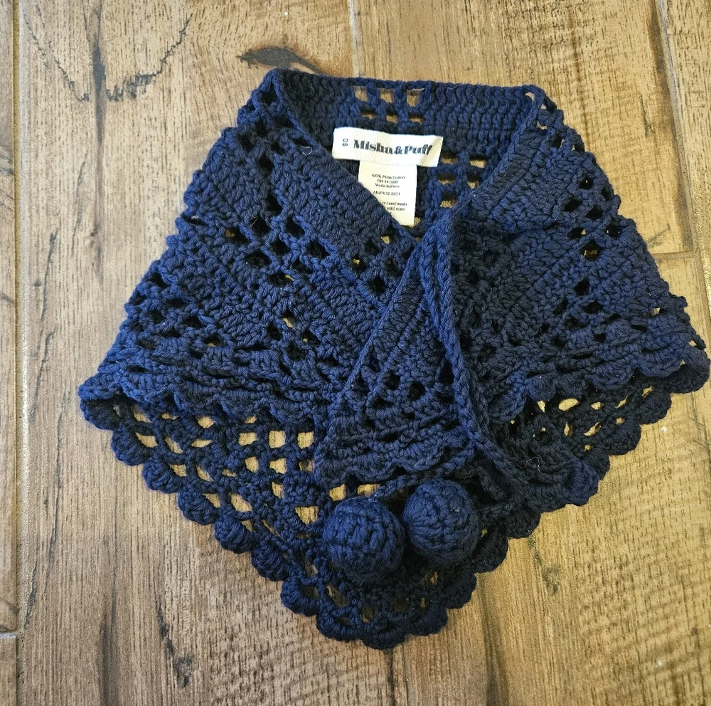 misha and puff black crochet scarf with pom poms
